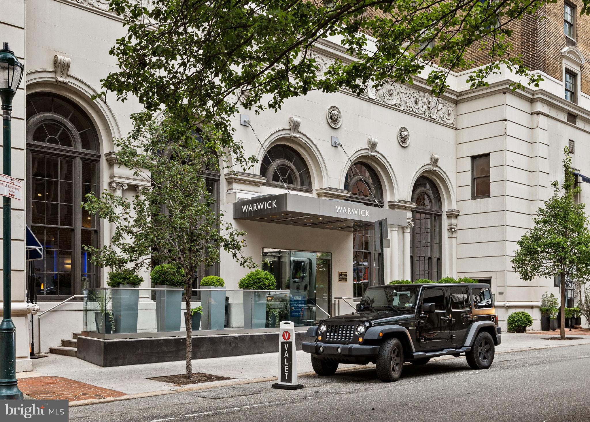 1701 Locust Street, Unit 1602 Philadelphia, PA 19103 - Photo 23 of 28 a car parked in front of a house
