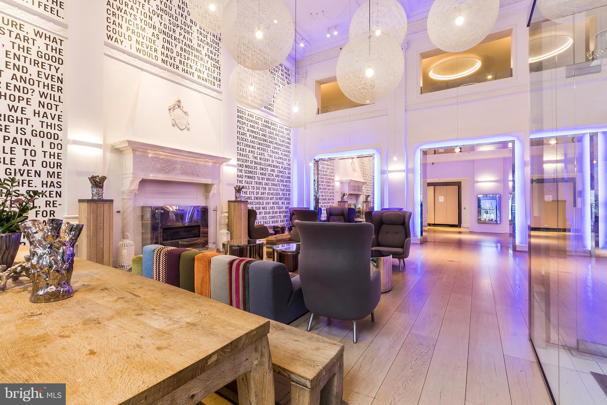 1701 Locust Street, Unit 1602 Philadelphia, PA 19103 - Photo 25 of 28 a view of a dining room with furniture and wooden floor