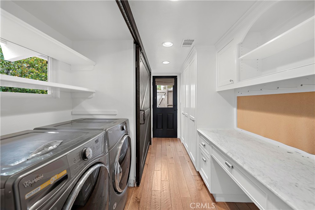 707 Emerald Bay Laguna Beach, CA 92651 - Photo 15 of 50 a view of a kitchen with a sink and dishwasher