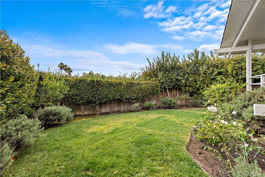 707 Emerald Bay Laguna Beach, CA 92651 - Photo 27 of 50 a view of a garden with a building in the background