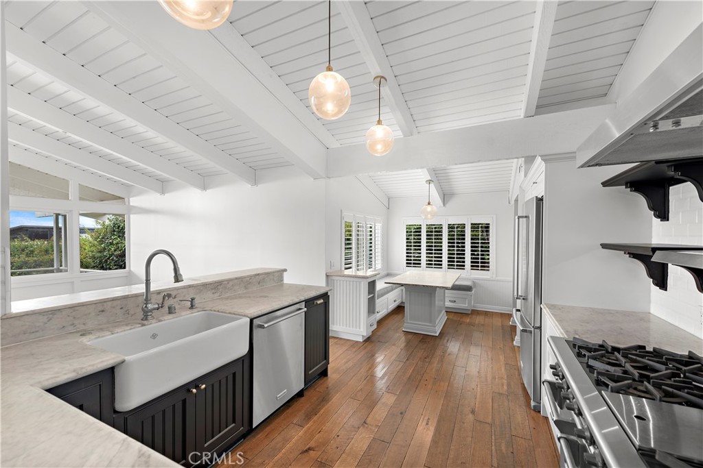 707 Emerald Bay Laguna Beach, CA 92651 - Photo 7 of 50 a kitchen with sink stove and refrigerator