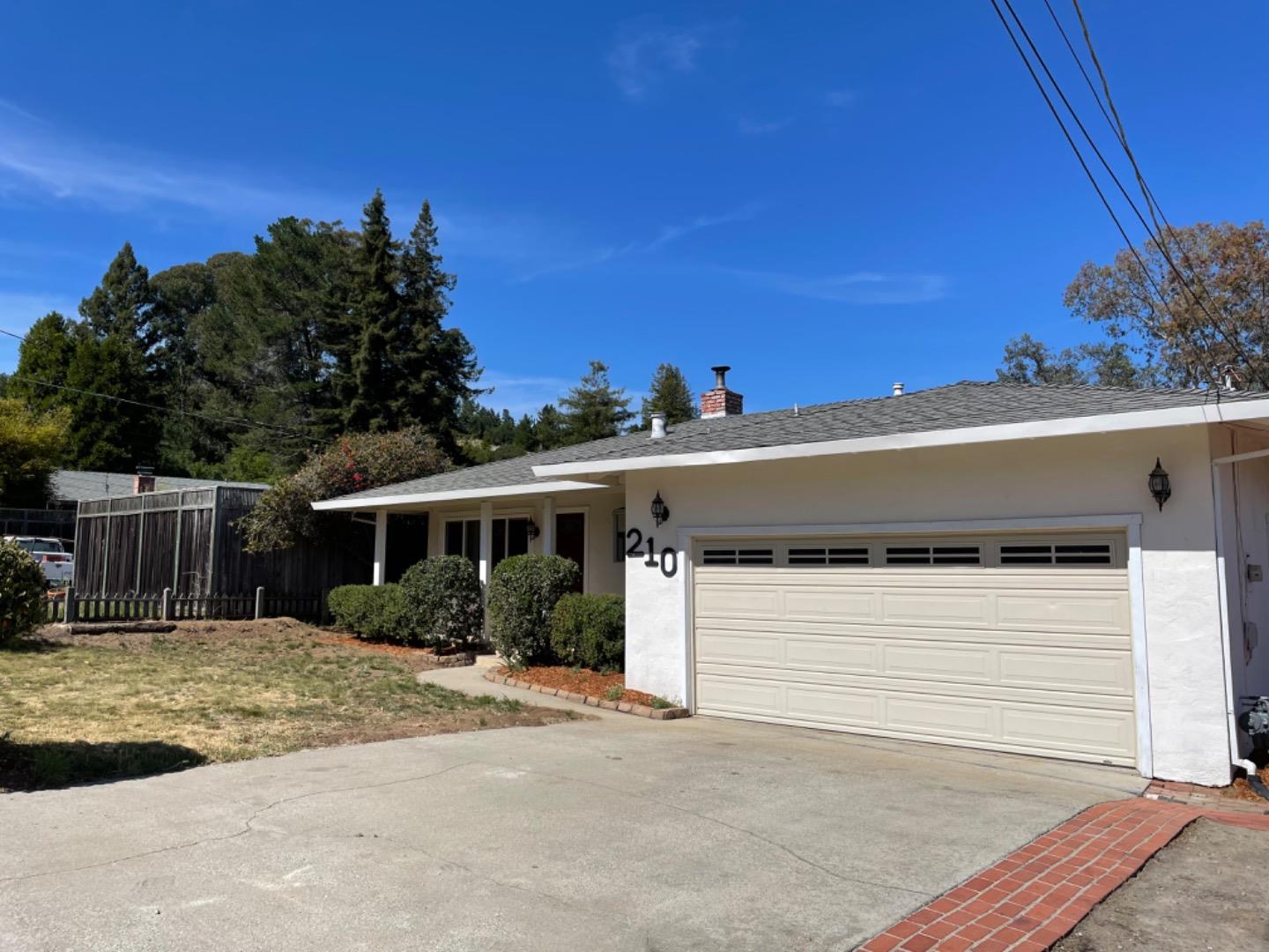 210 Hames Road Corralitos, CA 95076 - Photo 1 of 17 a view of a house with a garage
