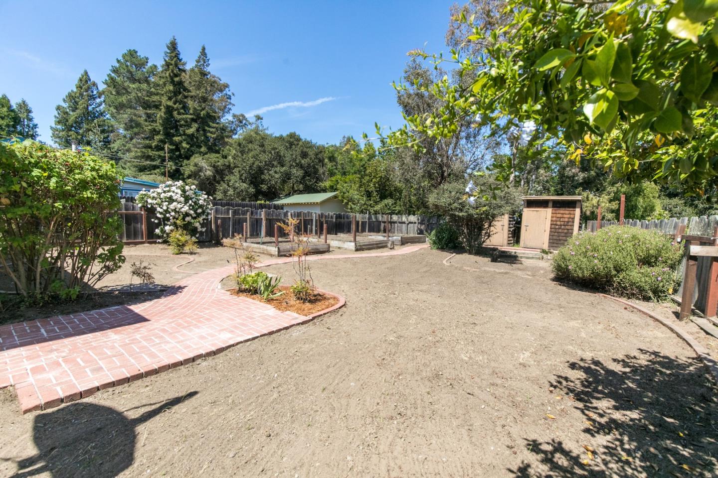 210 Hames Road Corralitos, CA 95076 - Photo 2 of 17 a view of a backyard with sitting area