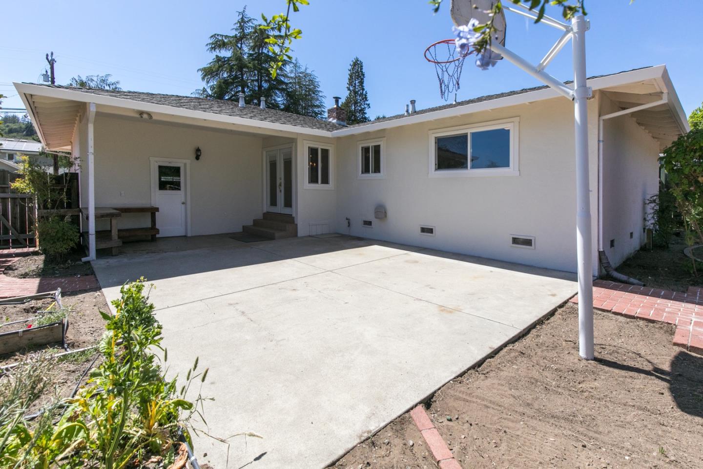 210 Hames Road Corralitos, CA 95076 - Photo 5 of 17 a view of backyard with a garage