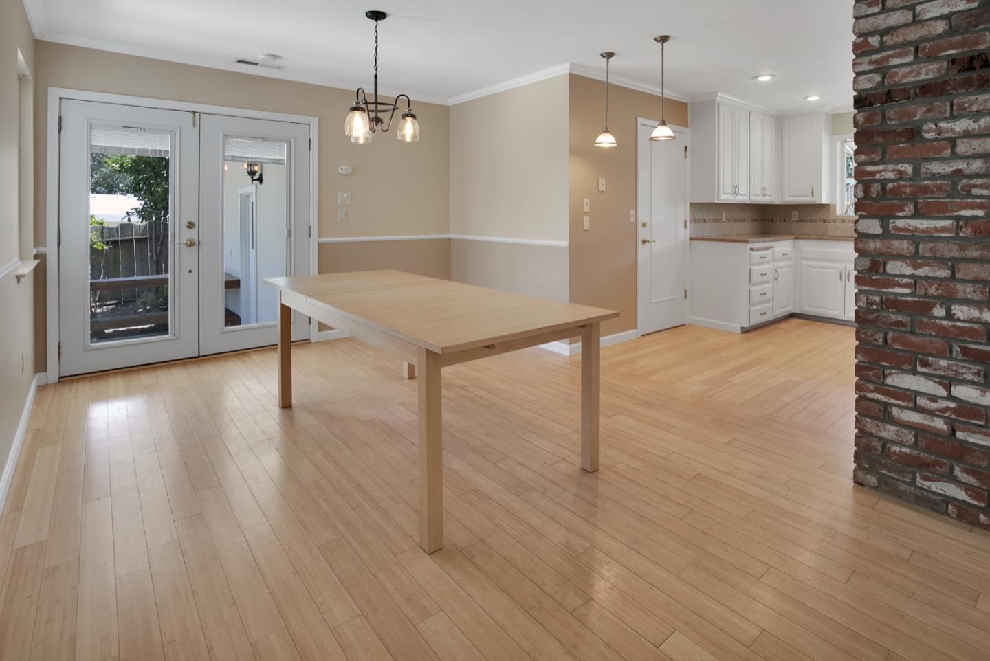 210 Hames Road Corralitos, CA 95076 - Photo 8 of 17 a room with wooden floor and window