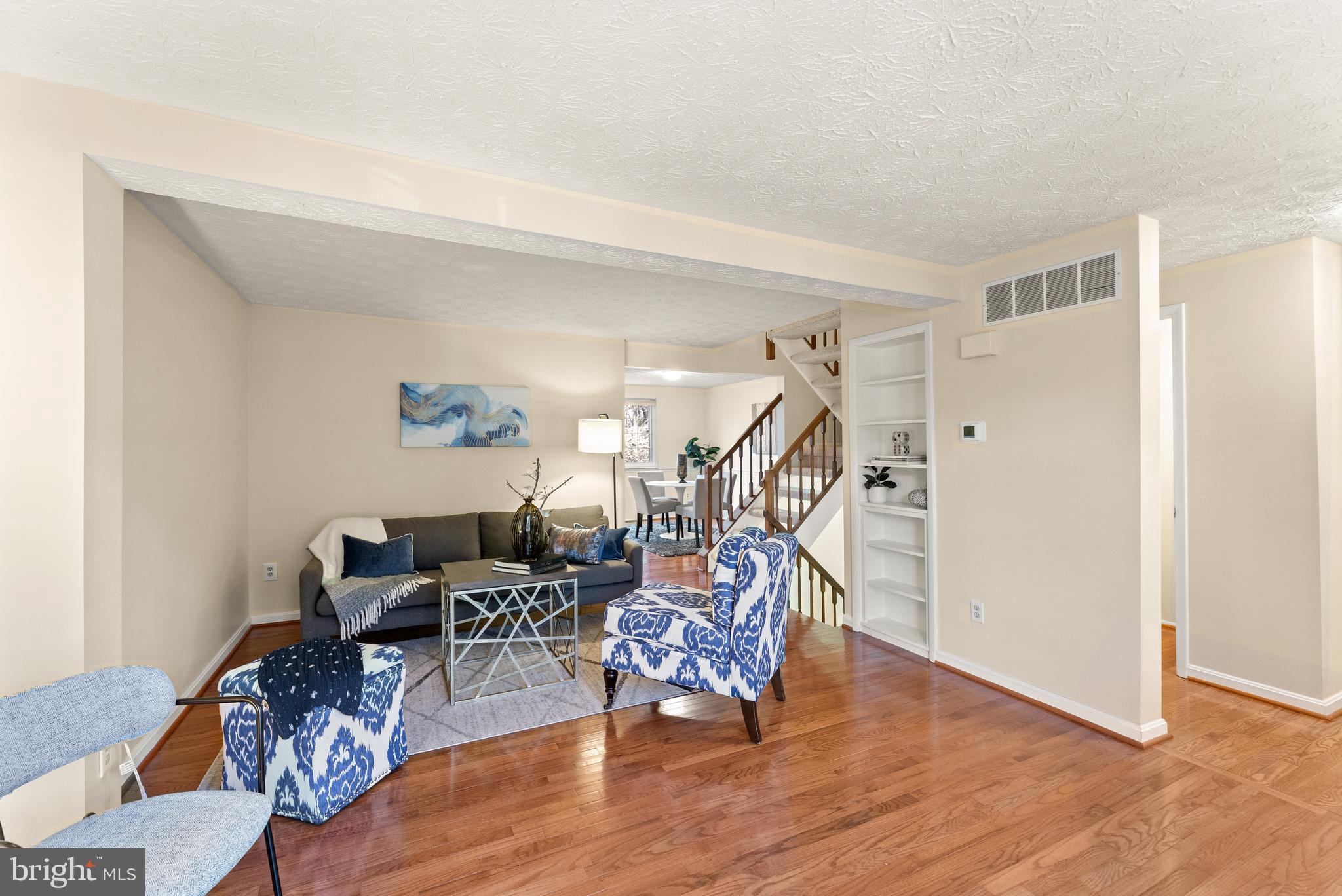 1616 Barnstead Drive Reston, VA 20194 - Photo 11 of 49 a view of a livingroom with furniture and wooden floor