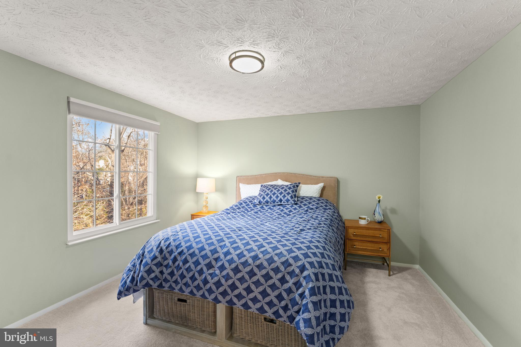 1616 Barnstead Drive Reston, VA 20194 - Photo 25 of 49 a bedroom with a bed and a window