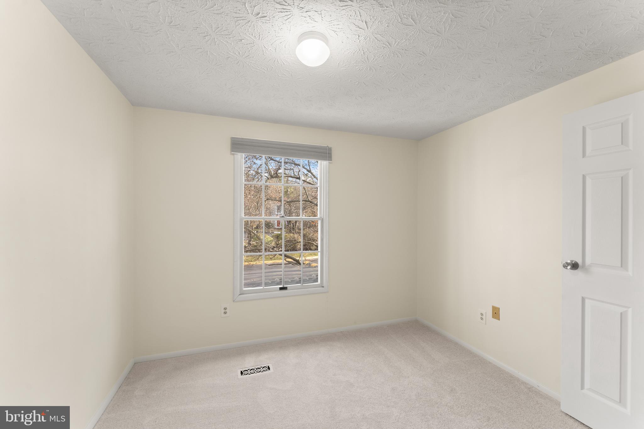 1616 Barnstead Drive Reston, VA 20194 - Photo 36 of 49 an empty room with a empty space and windows