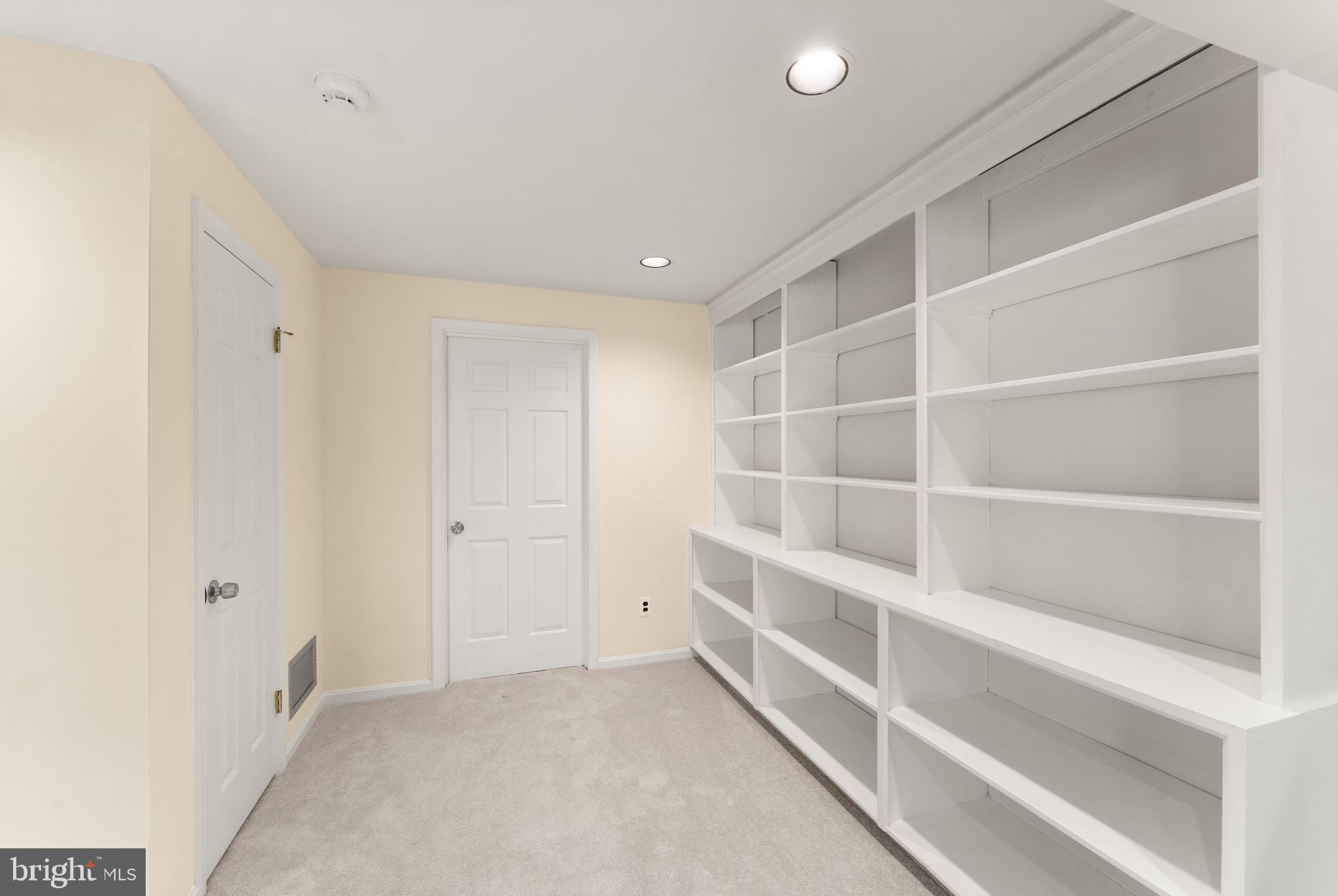 1616 Barnstead Drive Reston, VA 20194 - Photo 42 of 49 a view of an empty room with empty racks