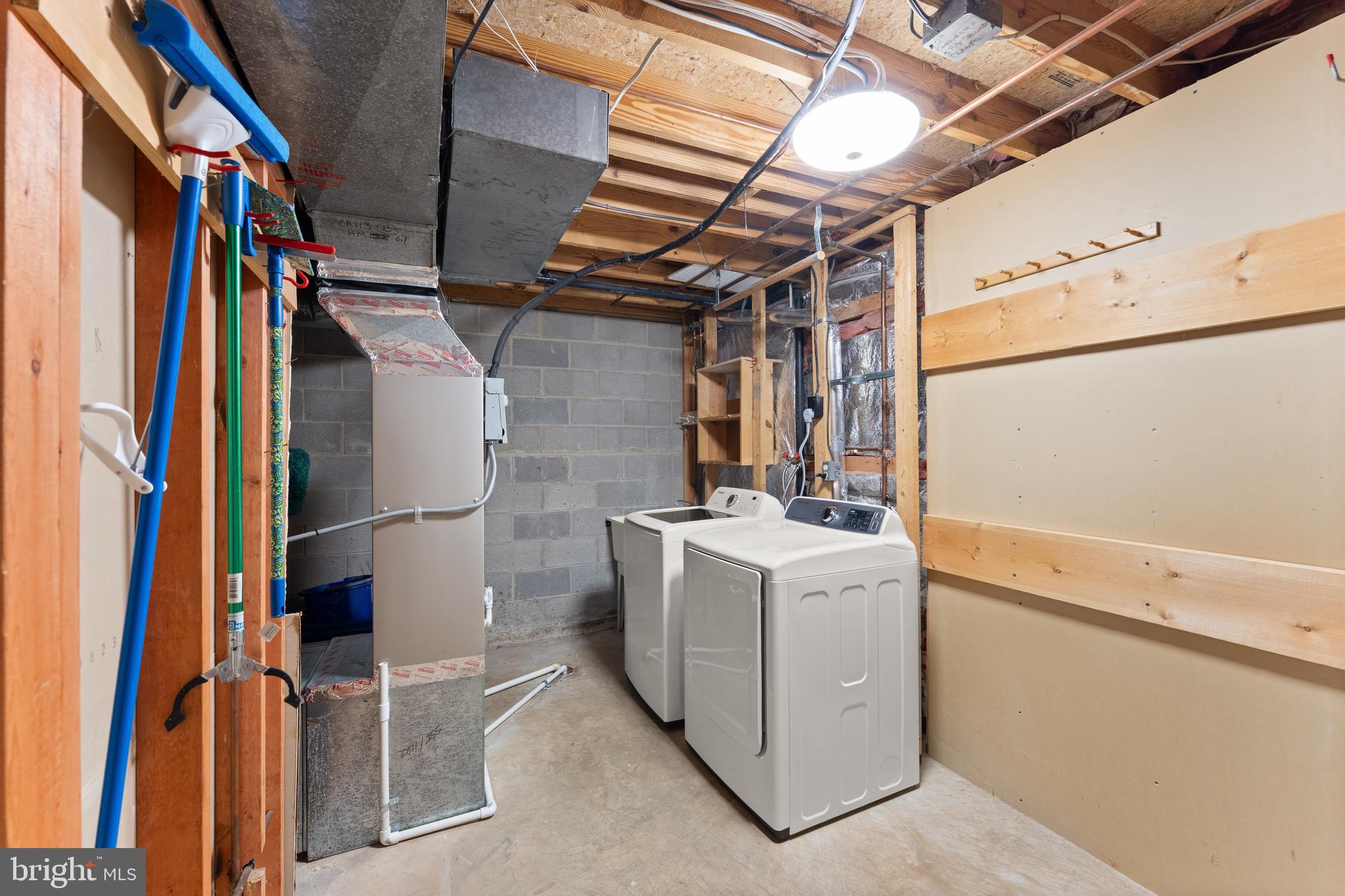 1616 Barnstead Drive Reston, VA 20194 - Photo 44 of 49 a utility room with dryer and washer