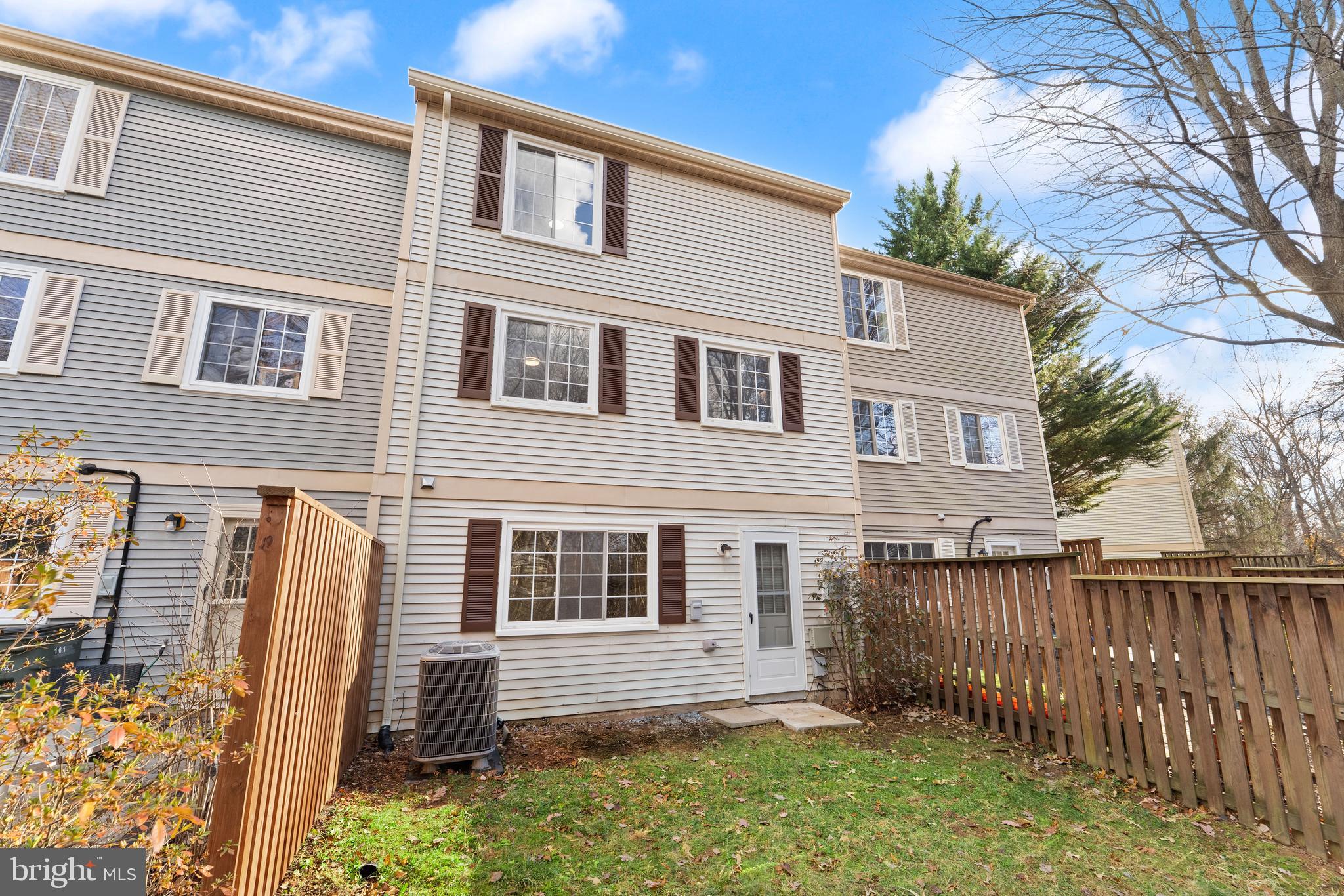 1616 Barnstead Drive Reston, VA 20194 - Photo 47 of 49 a front view of a house with a garden