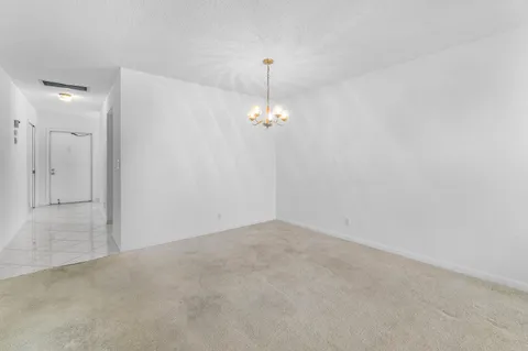 a view of a room with an entryway
