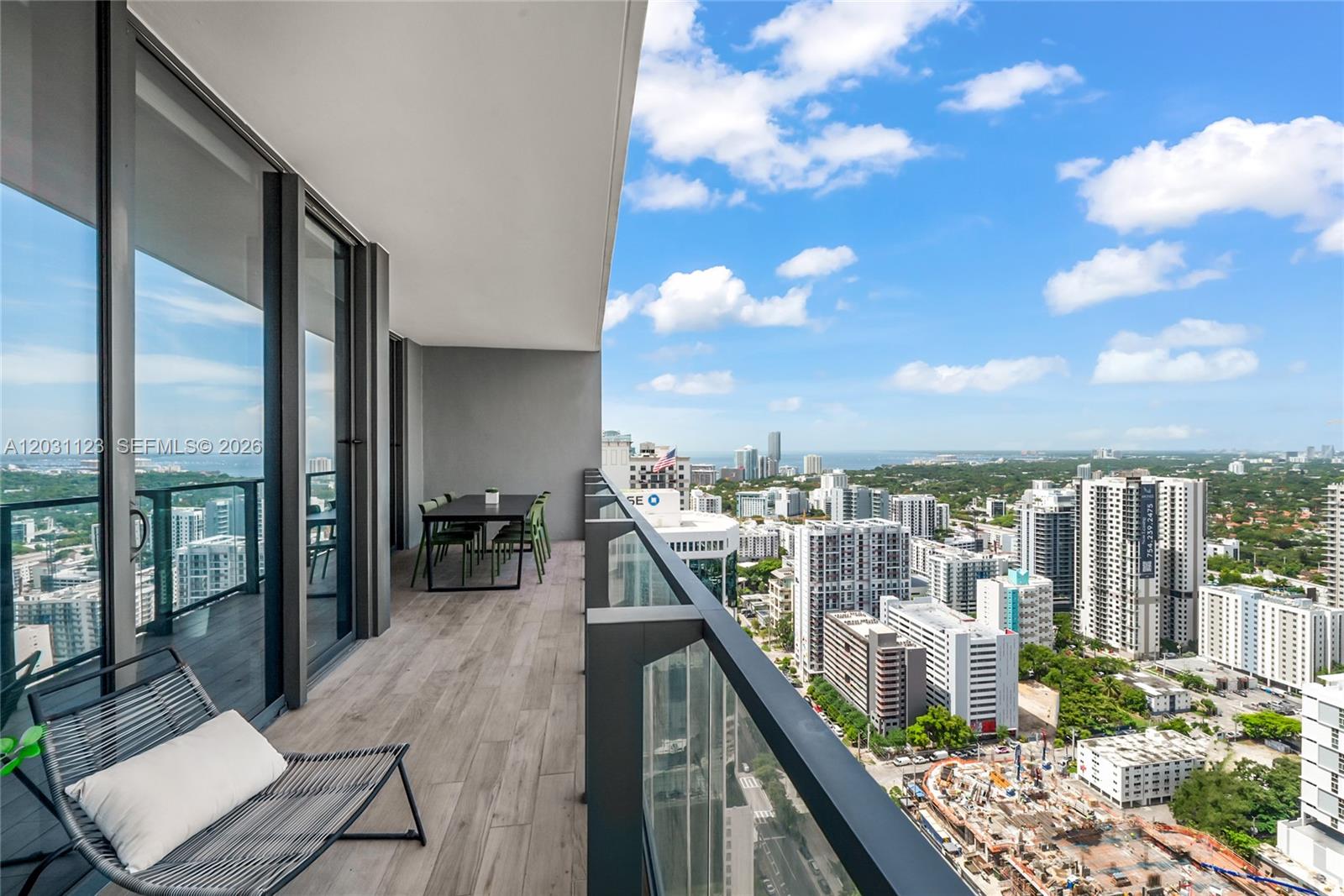 88 Southwest 7th Street, Unit 3208 Miami, FL 33130 - Photo 2 of 16 a view of a balcony with city view