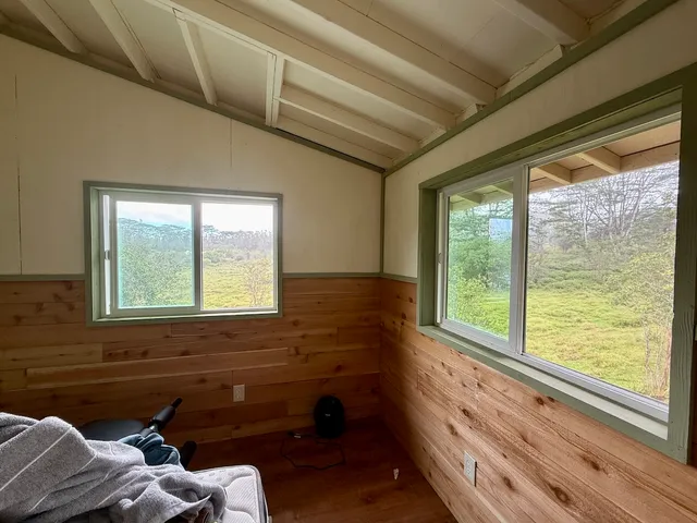 a room with furniture and a window