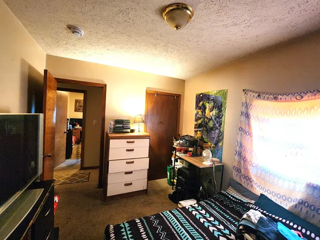 a room with furniture and a window