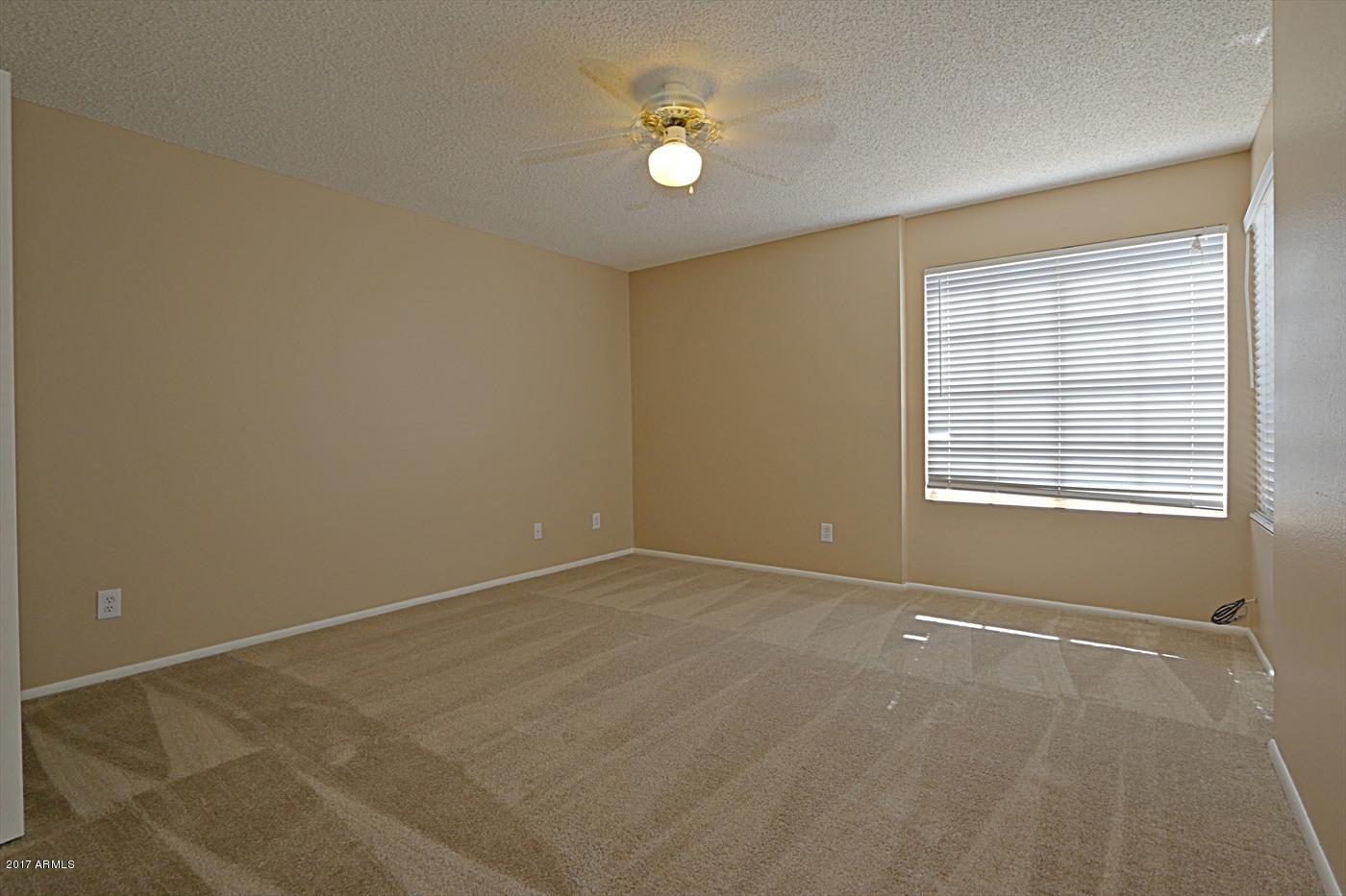 1055 North Recker Road, Unit 1256 Mesa, AZ 85205 - Photo 26 of 36 Master Bedroom 1