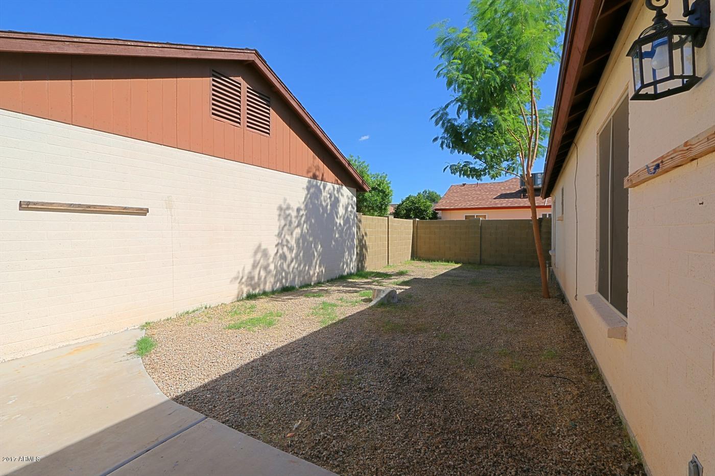1055 North Recker Road, Unit 1256 Mesa, AZ 85205 - Photo 29 of 36 Backyard 1