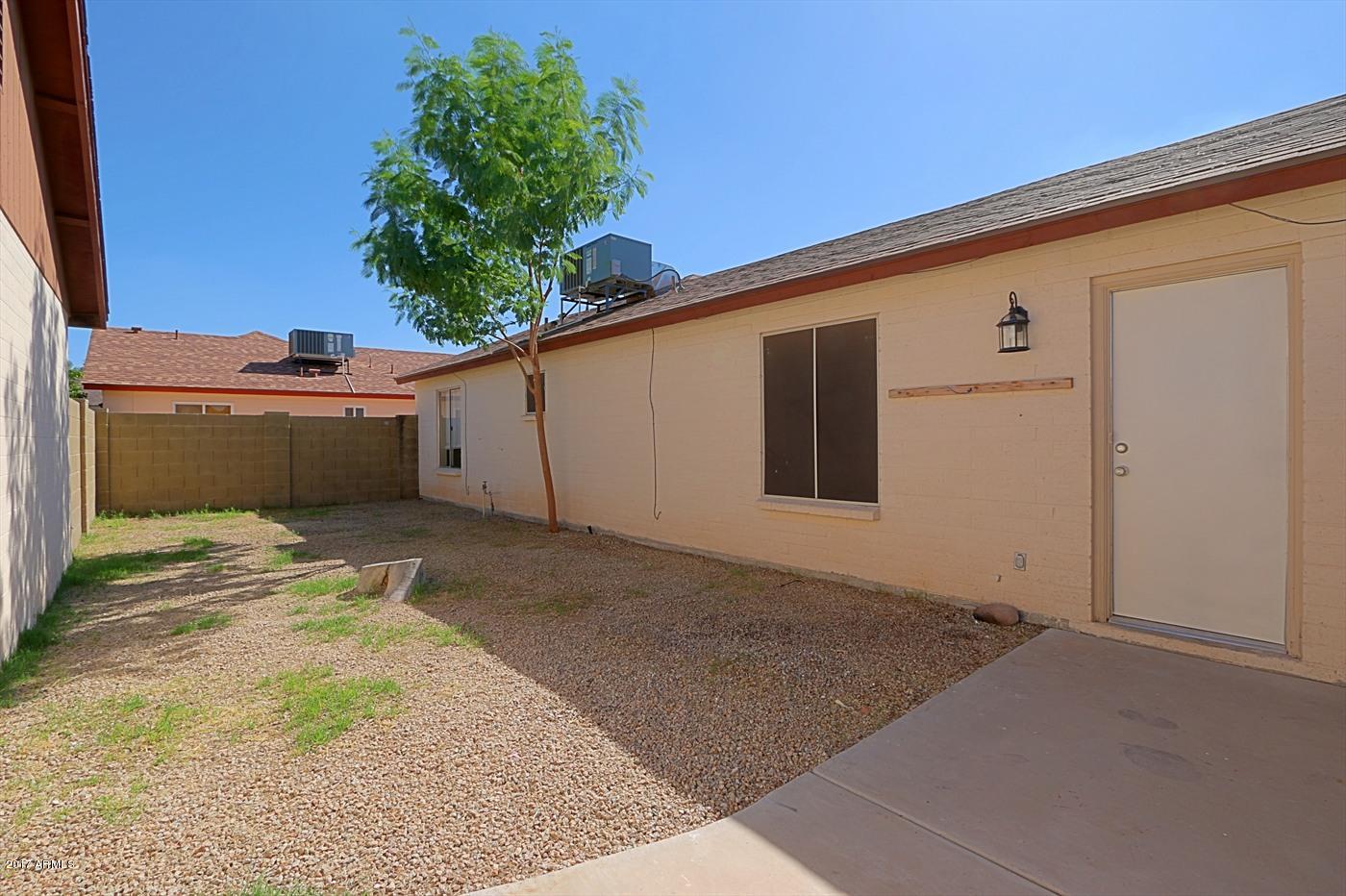 1055 North Recker Road, Unit 1256 Mesa, AZ 85205 - Photo 30 of 36 Backyard 2