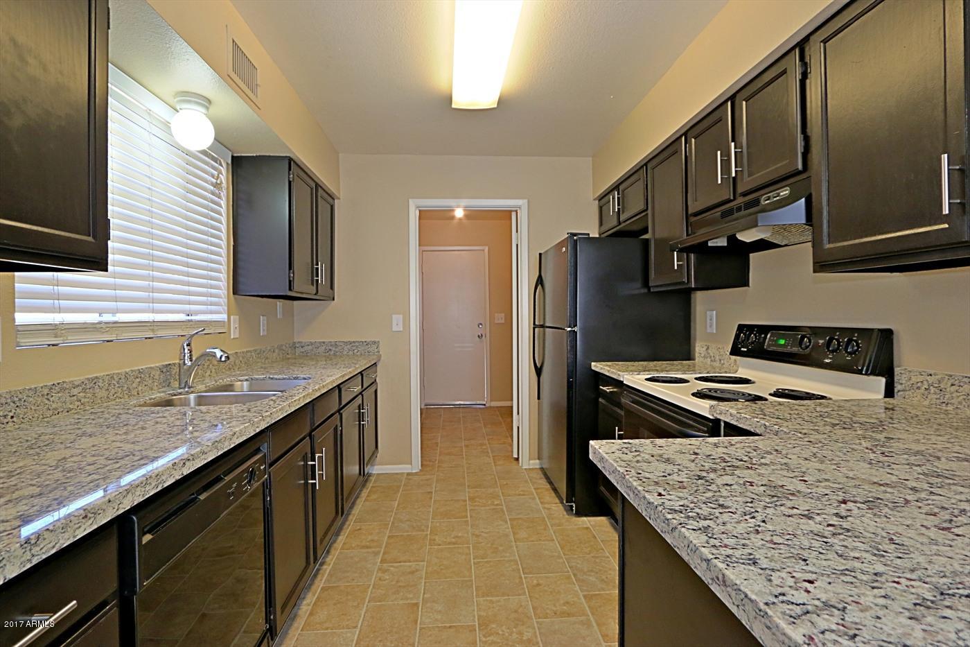 1055 North Recker Road, Unit 1256 Mesa, AZ 85205 - Photo 9 of 36 Kitchen 1