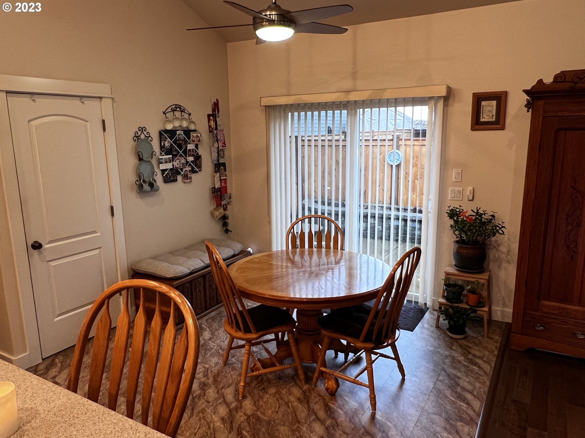 947 67th Place Springfield, OR 97478 - Photo 11 of 32 a view of a a dining room with furniture window and wooden floor