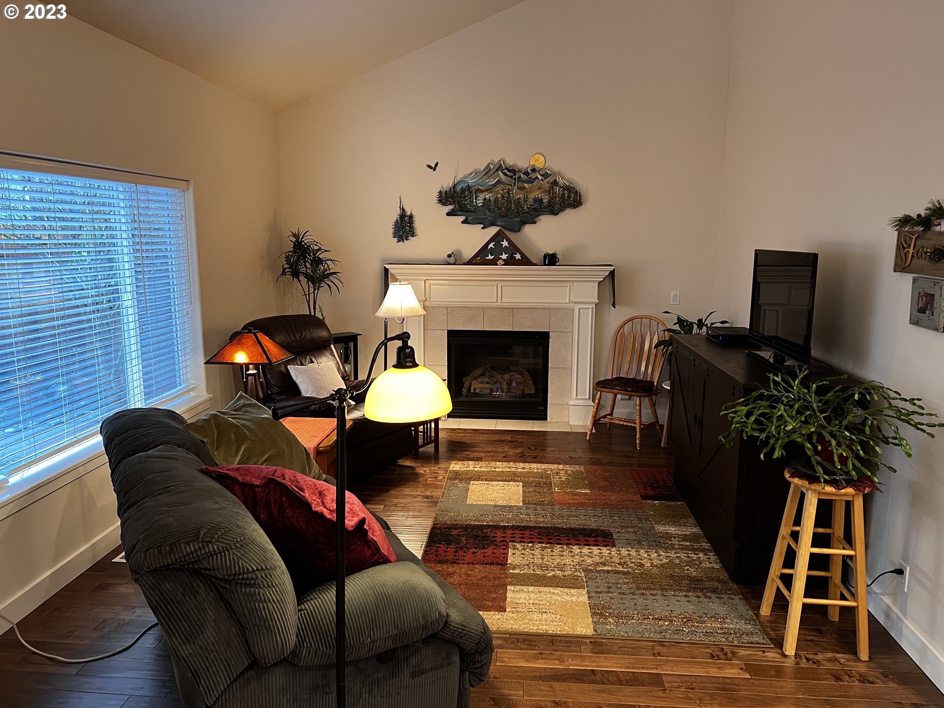 947 67th Place Springfield, OR 97478 - Photo 13 of 32 a living room with furniture and a fireplace