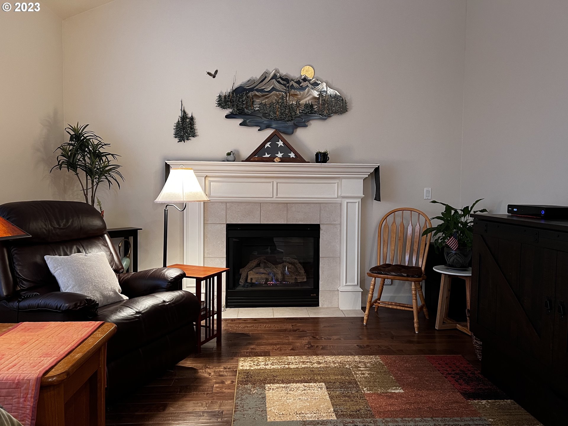 947 67th Place Springfield, OR 97478 - Photo 14 of 32 a living room with furniture and a fireplace