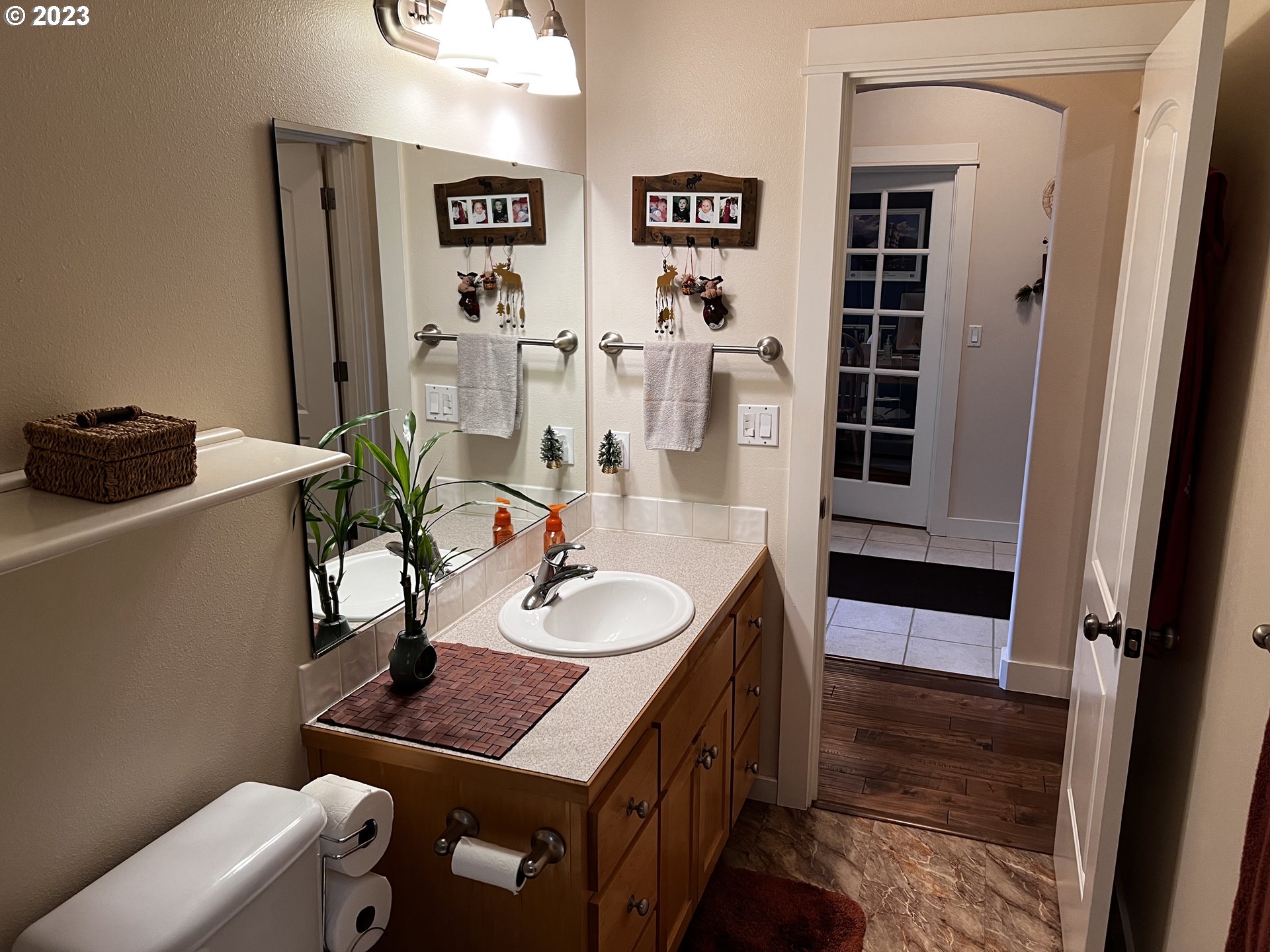 947 67th Place Springfield, OR 97478 - Photo 19 of 32 a bathroom with a sink a toilet and shower