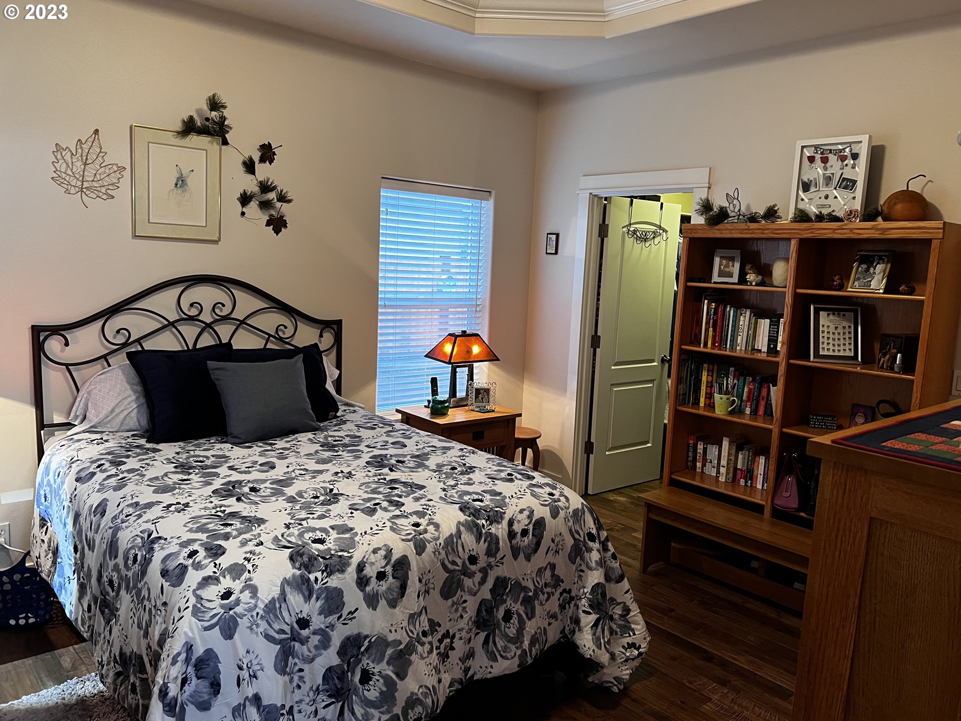 947 67th Place Springfield, OR 97478 - Photo 24 of 32 a bedroom with a bed and book shelf
