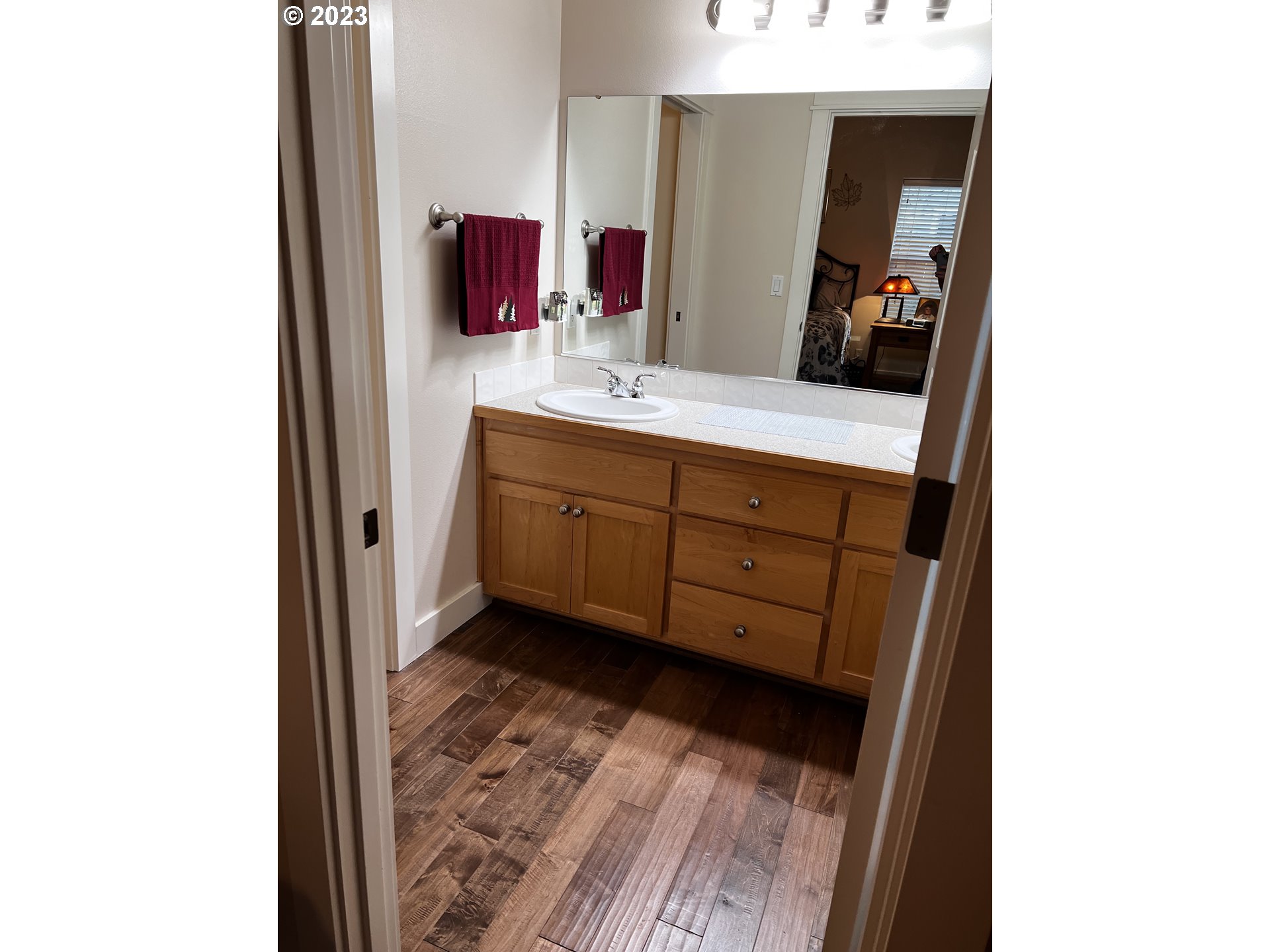 947 67th Place Springfield, OR 97478 - Photo 26 of 32 a bathroom with a sink and a mirror