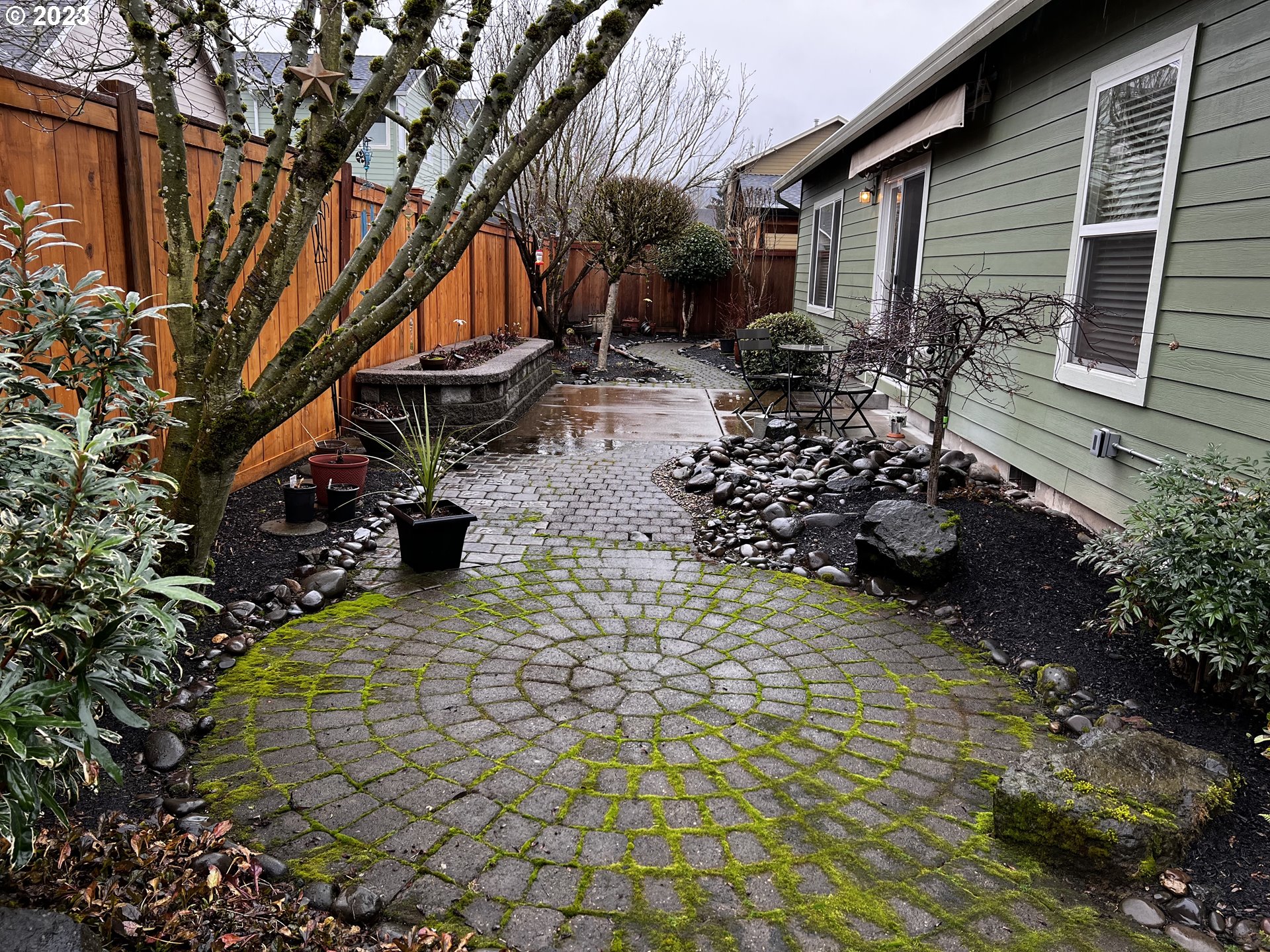947 67th Place Springfield, OR 97478 - Photo 30 of 32 a backyard of a house with outdoor seating