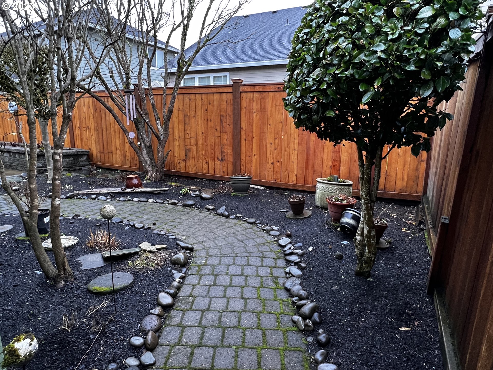 947 67th Place Springfield, OR 97478 - Photo 32 of 32 a backyard of a house with barbeque oven