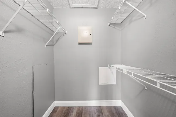 a view of a room with racks on the wall