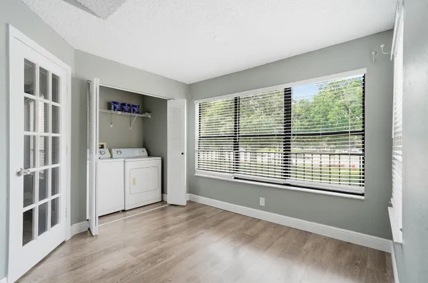 a view of an empty room with a window