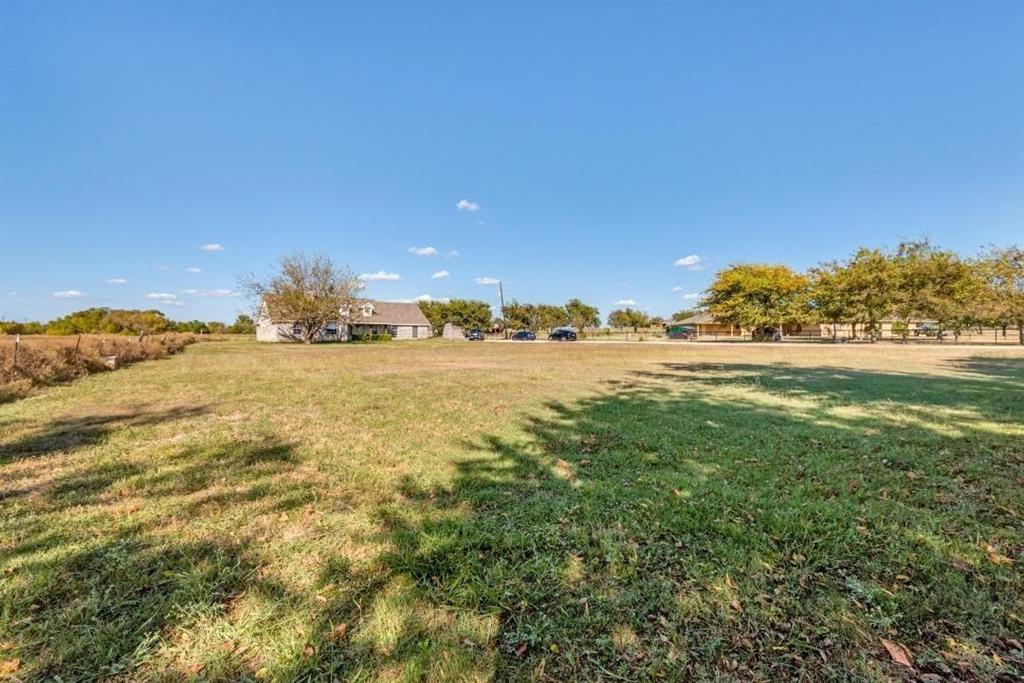 2072 Marshall Road Waxahachie, TX 75167 - Photo 13 of 14 a view of an ocean and a yard