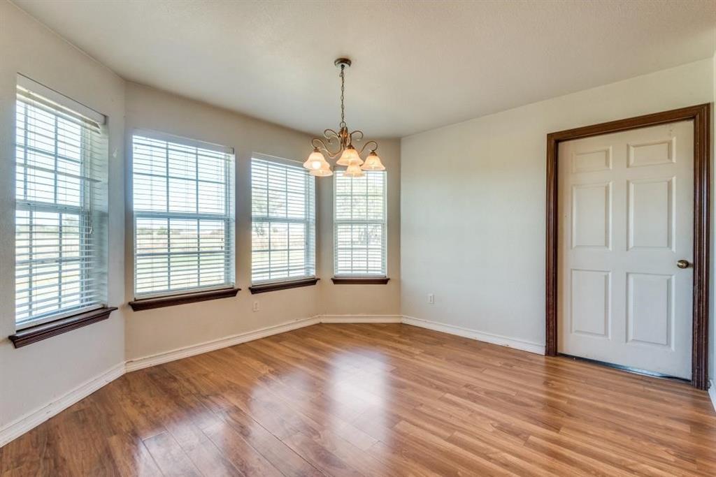 2072 Marshall Road Waxahachie, TX 75167 - Photo 8 of 14 a view of a room with window and wooden floor