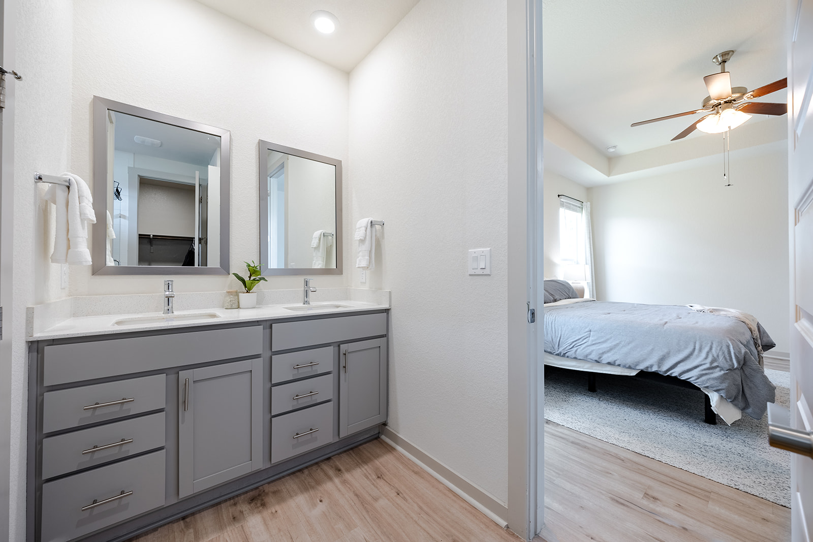 900 Balsora Cove Georgetown, TX 78628 - Photo 14 of 39 Double vanity in this primary bathroom provides ample space and sleek design.