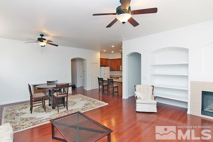 450 Manciano Way Reno, NV 89521 - Photo 12 of 39 a living room with furniture and wooden floor
