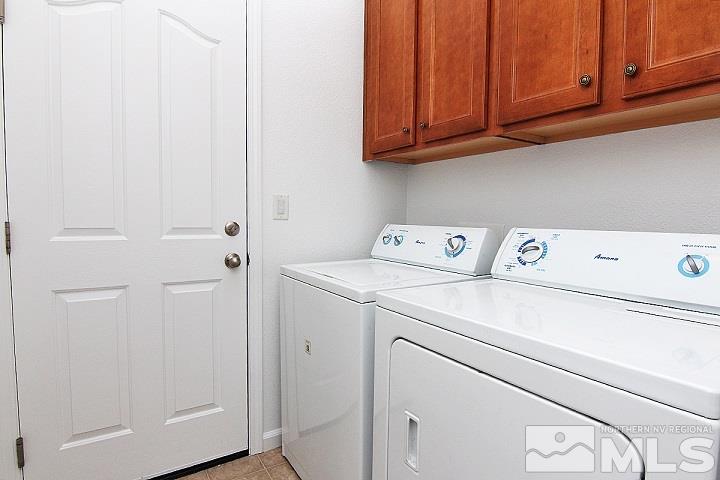 450 Manciano Way Reno, NV 89521 - Photo 31 of 39 a utility room with dryer and washer