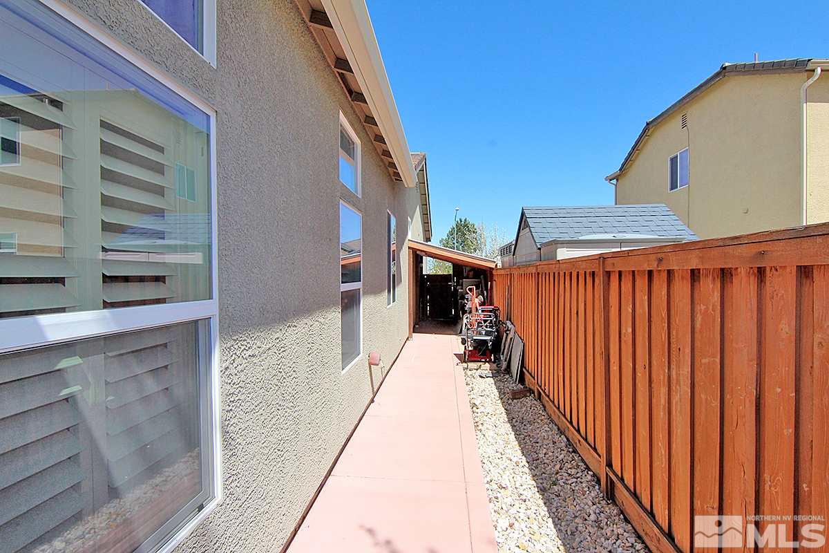 450 Manciano Way Reno, NV 89521 - Photo 38 of 39 a narrow alley leading to a building