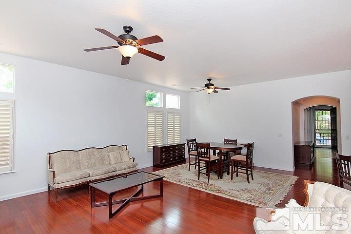 450 Manciano Way Reno, NV 89521 - Photo 7 of 39 a living room with furniture and wooden floor