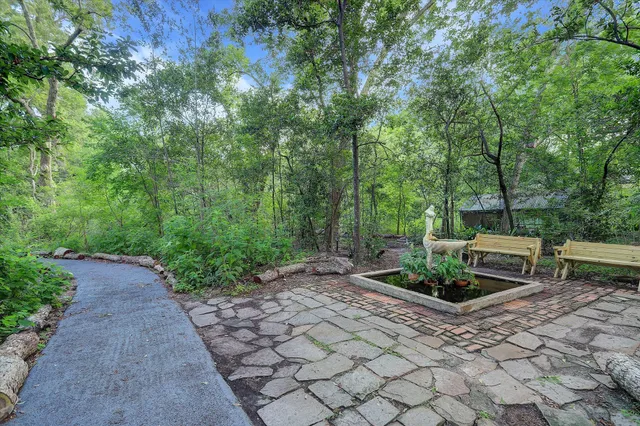 a garden view with a seating space