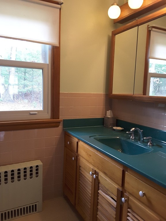 40 Anderson Road Ware, MA 01082 - Photo 14 of 19 a bathroom with a sink and a mirror