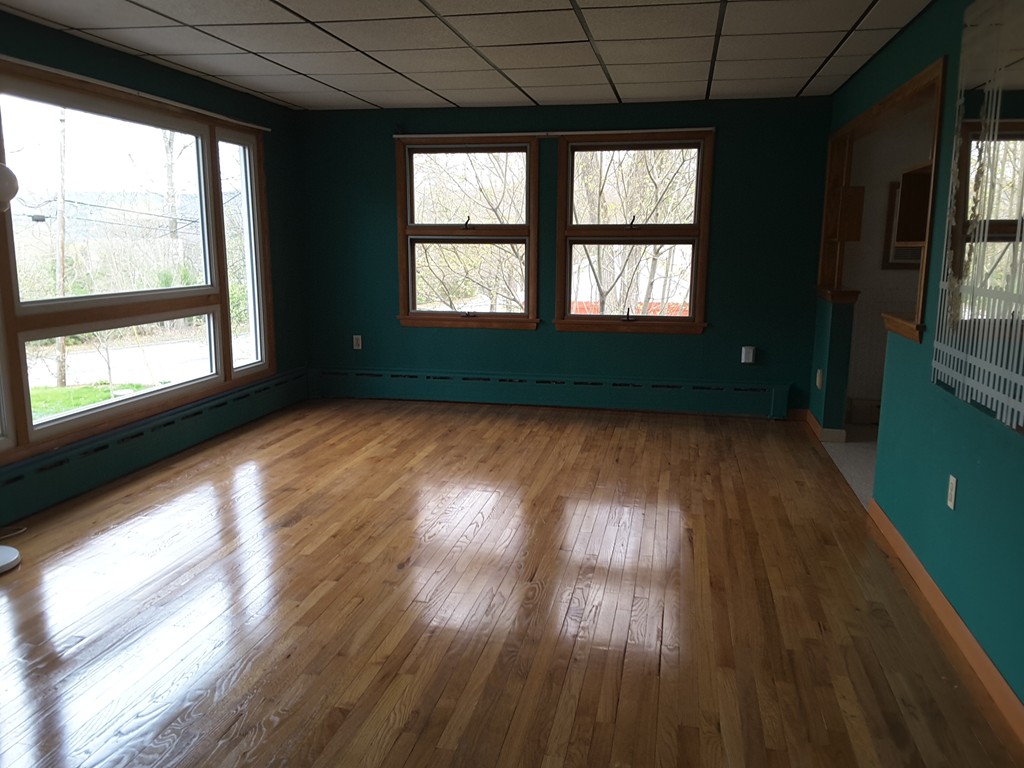 40 Anderson Road Ware, MA 01082 - Photo 10 of 19 a view of an empty room and wooden floor and a window