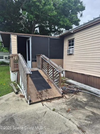 a room with furniture and a window