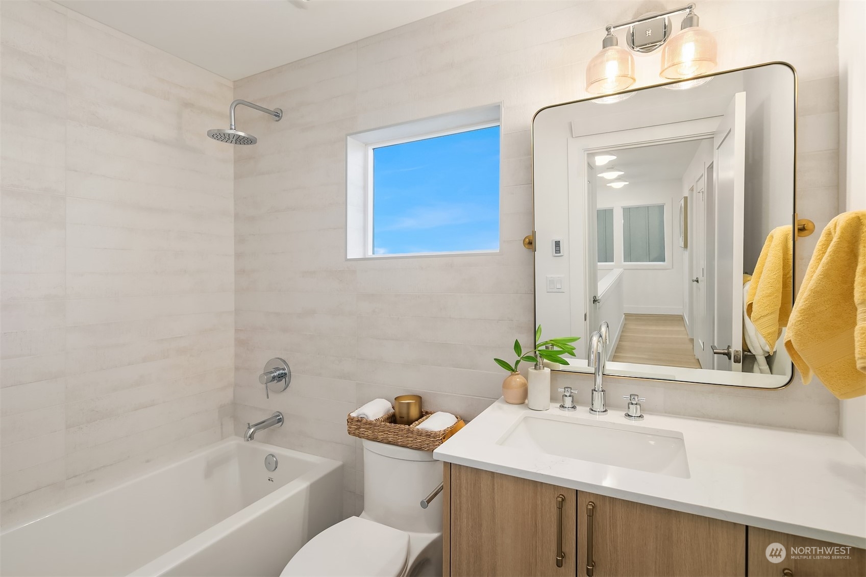 3011 Northwest 66th Street Seattle, WA 98117 - Photo 13 of 15 a bathroom with a sink and a mirror