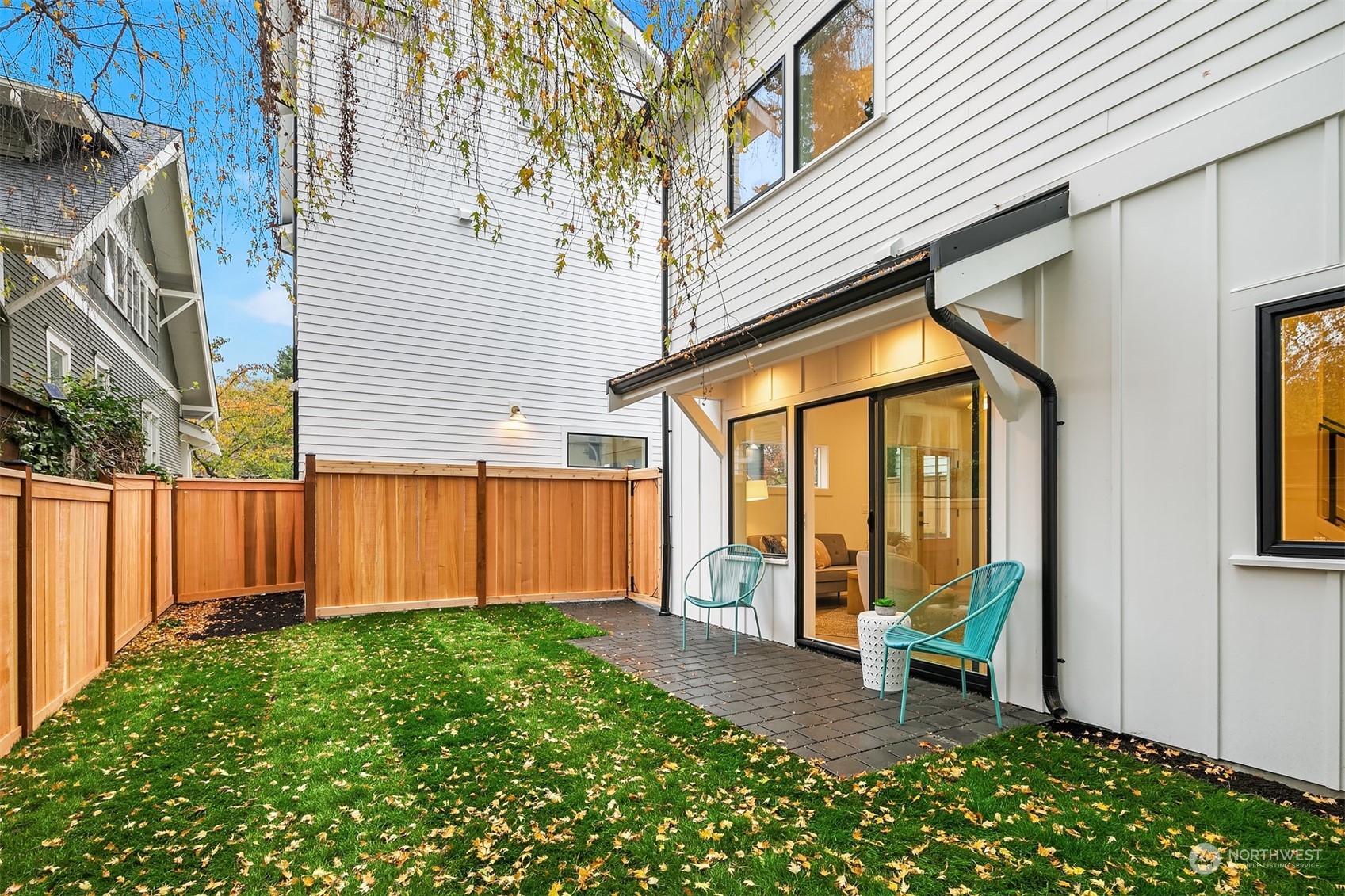 3011 Northwest 66th Street Seattle, WA 98117 - Photo 15 of 15 a view of a house with backyard and sitting area