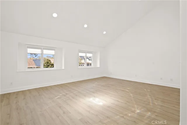 an empty room with windows