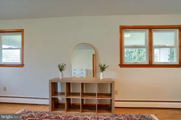 a view of a room that has a window