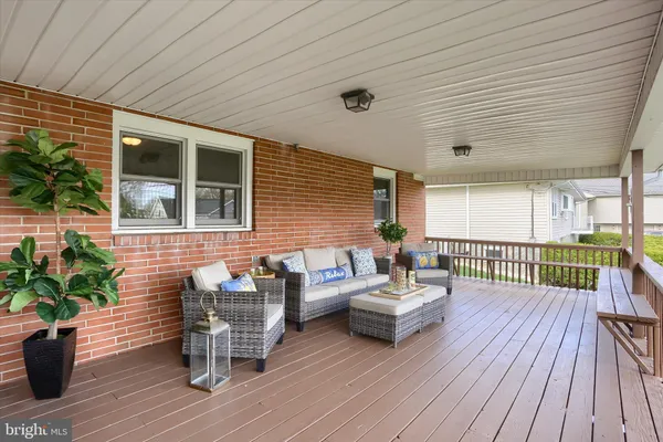 a patio with patio table and chairs
