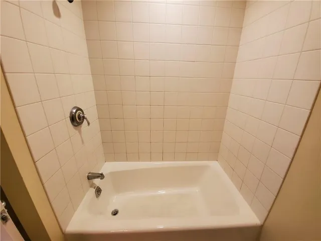 a bathroom with a bathtub
